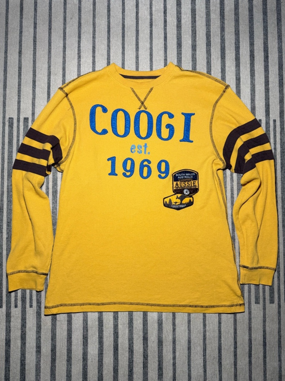 COOGI Men's Yellow Crewneck Sweater with Blue Logo and Brown Sleeve Stripes